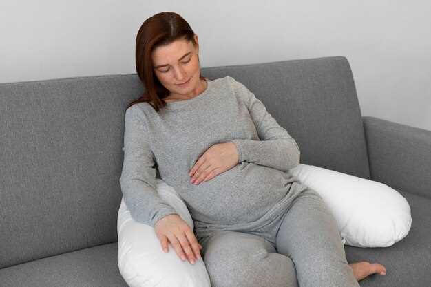 Почему возникает тянущая боль внизу живота в начале беременности